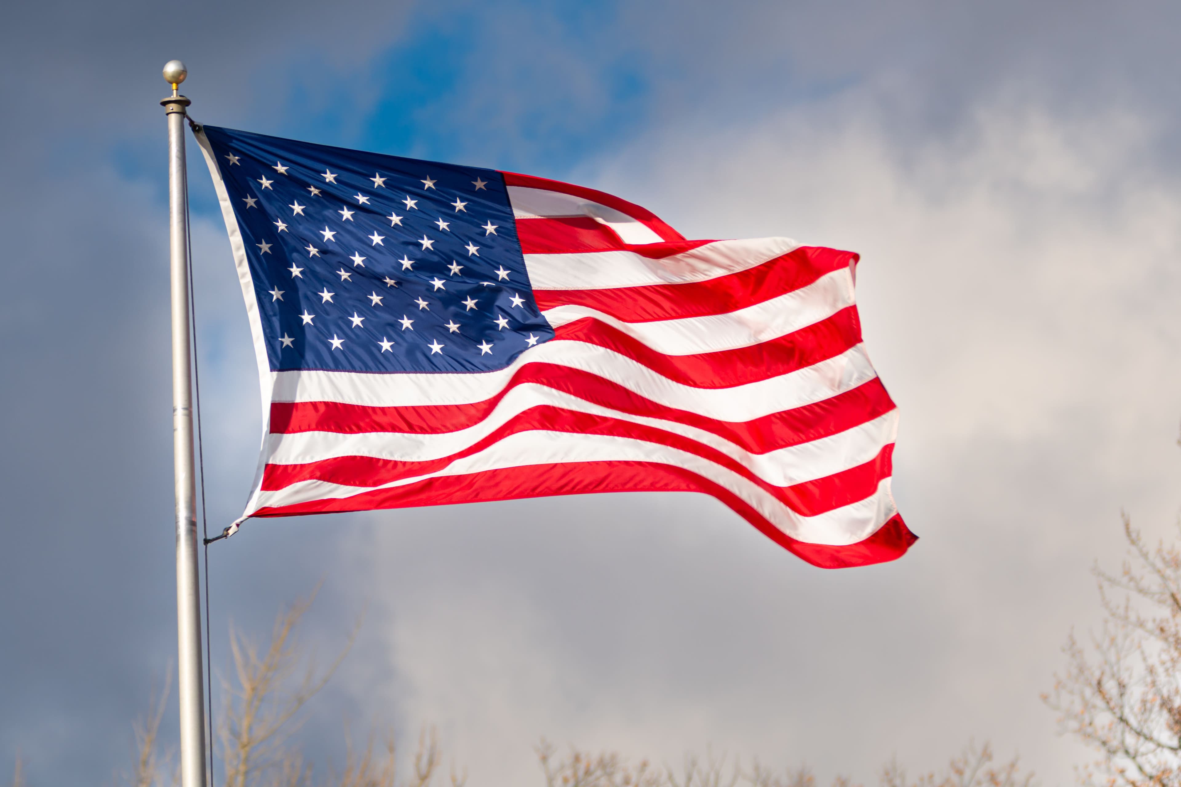 United States flag waving outdoors